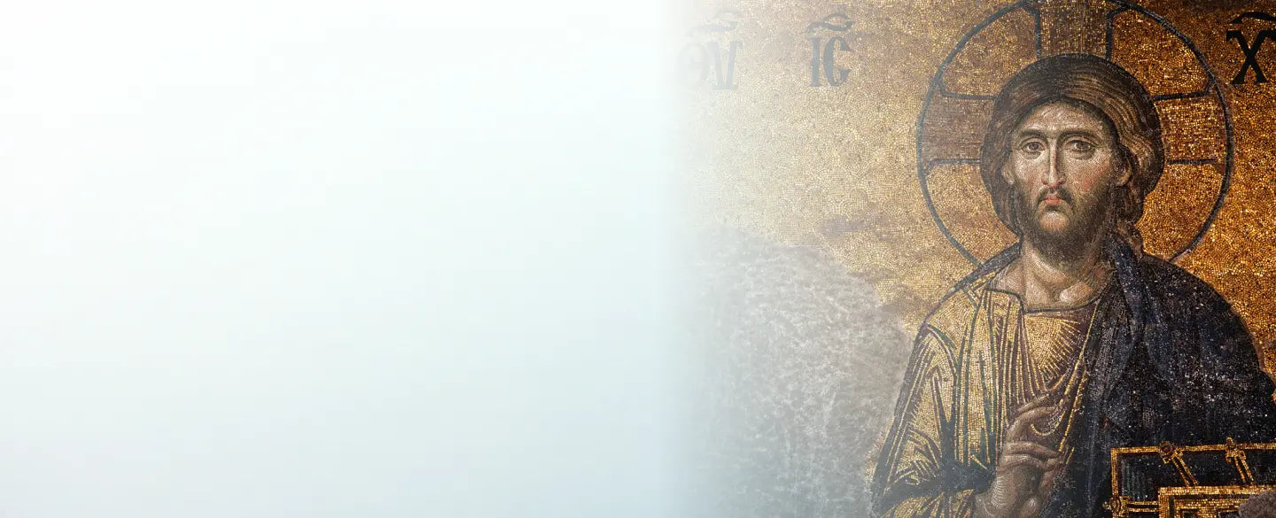Mosaic of a religious figure with a halo on a light background