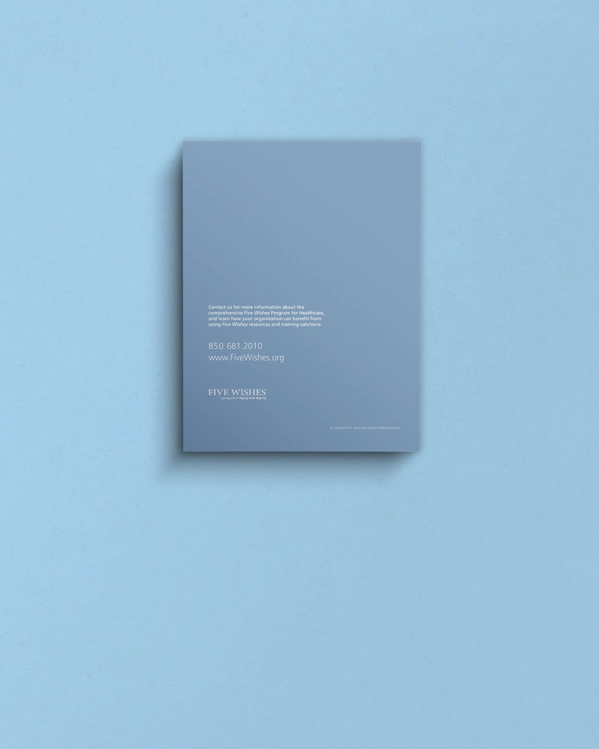 Gray book on a light blue background