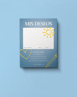 Book cover titled 'Mis Deseos' with decorative elements on a blue background