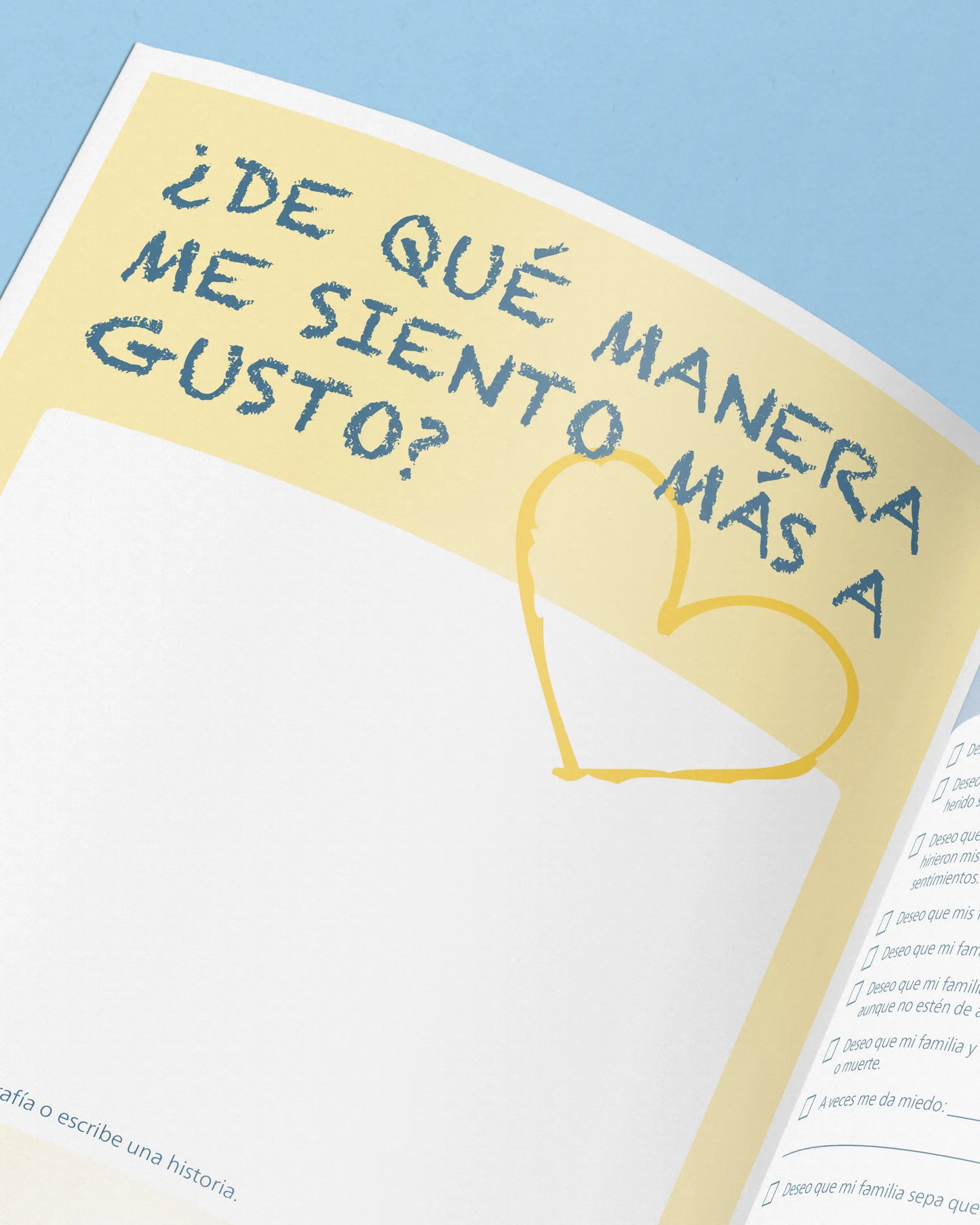 Open book with a yellow heart and text on a light blue background