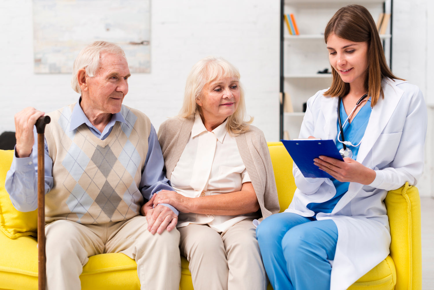 Doctor discussing report with old couple