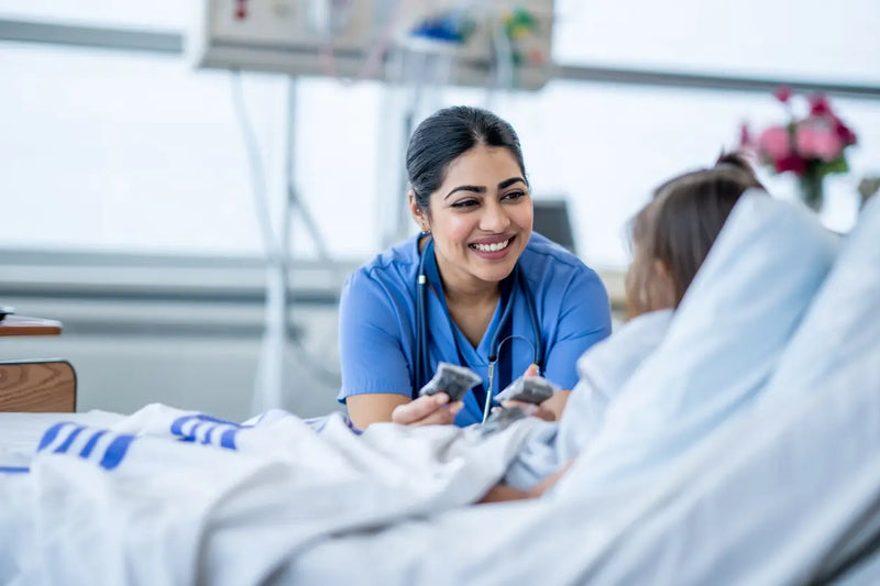 nurse checking on a patient