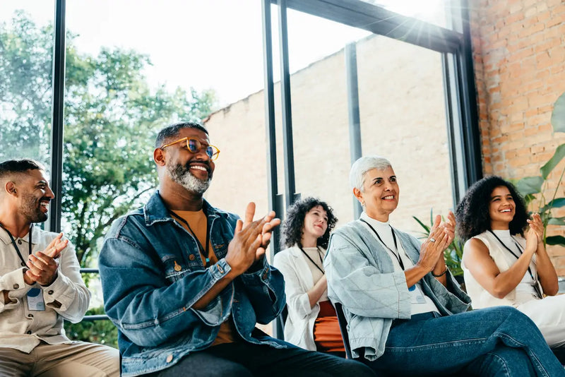 diverse group of people attending a business meeting